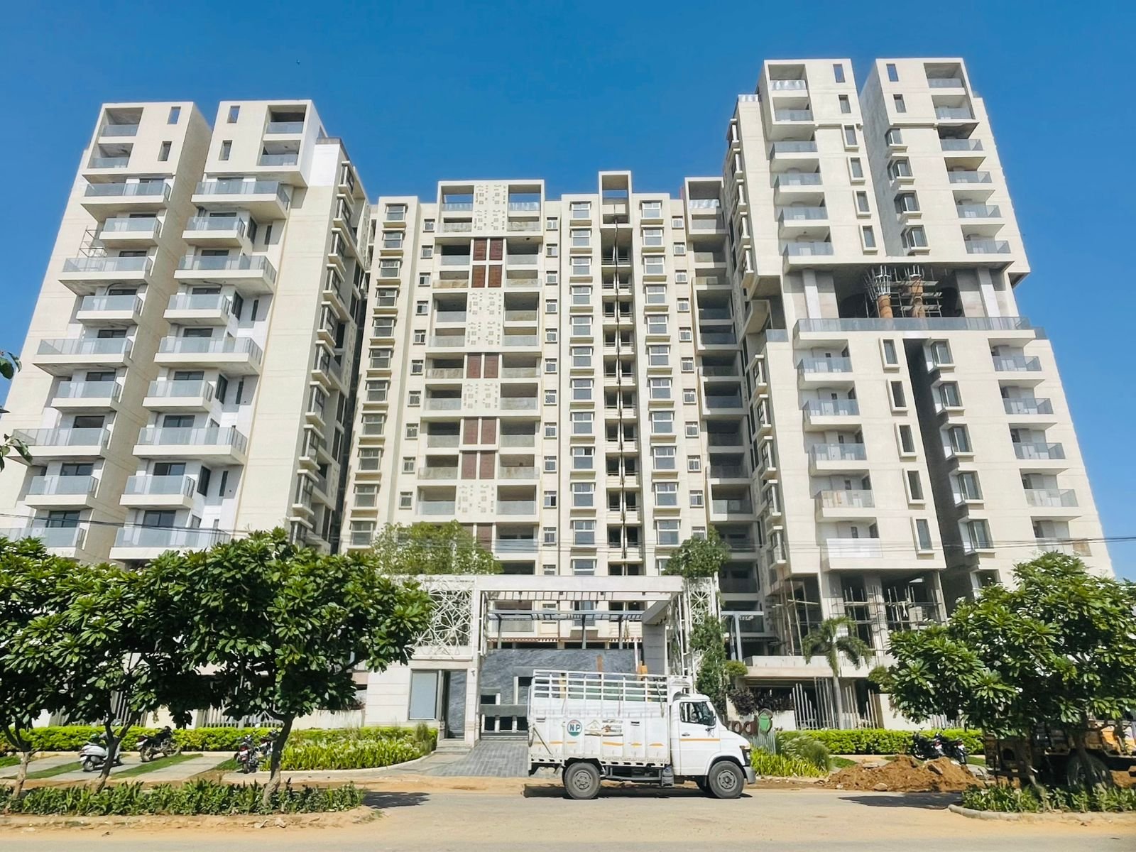 High-end apartment complex exterior in established Jaipur neighbourhood