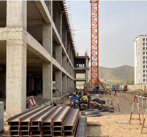 Engineers reviewing project plans on site